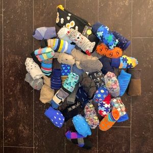 Lot of 42 pairs of novelty and dress socks.
